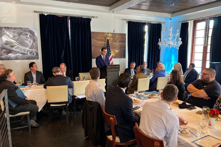 Editor Marshall Swanson speaks before audience at 2022 Best of Central Florida (BCF) awards luncheon at Hannibal's in Winter Park.