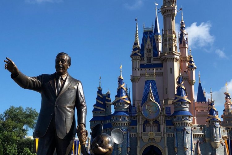 Statues of Walt Disney and Mickey Keep Watchful Eye On the Magic Kingdom